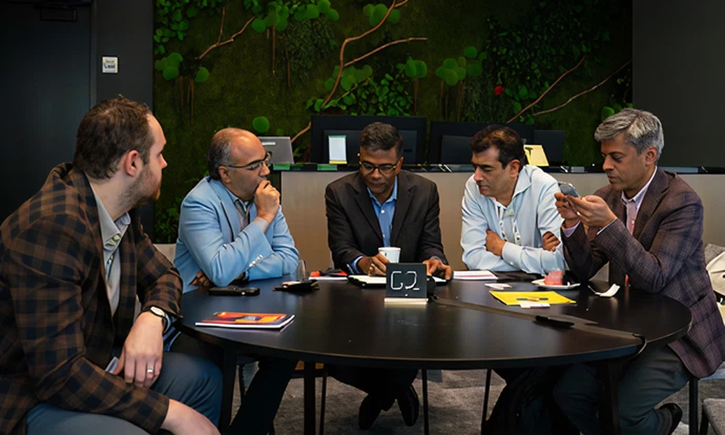 AuxoAI team working together